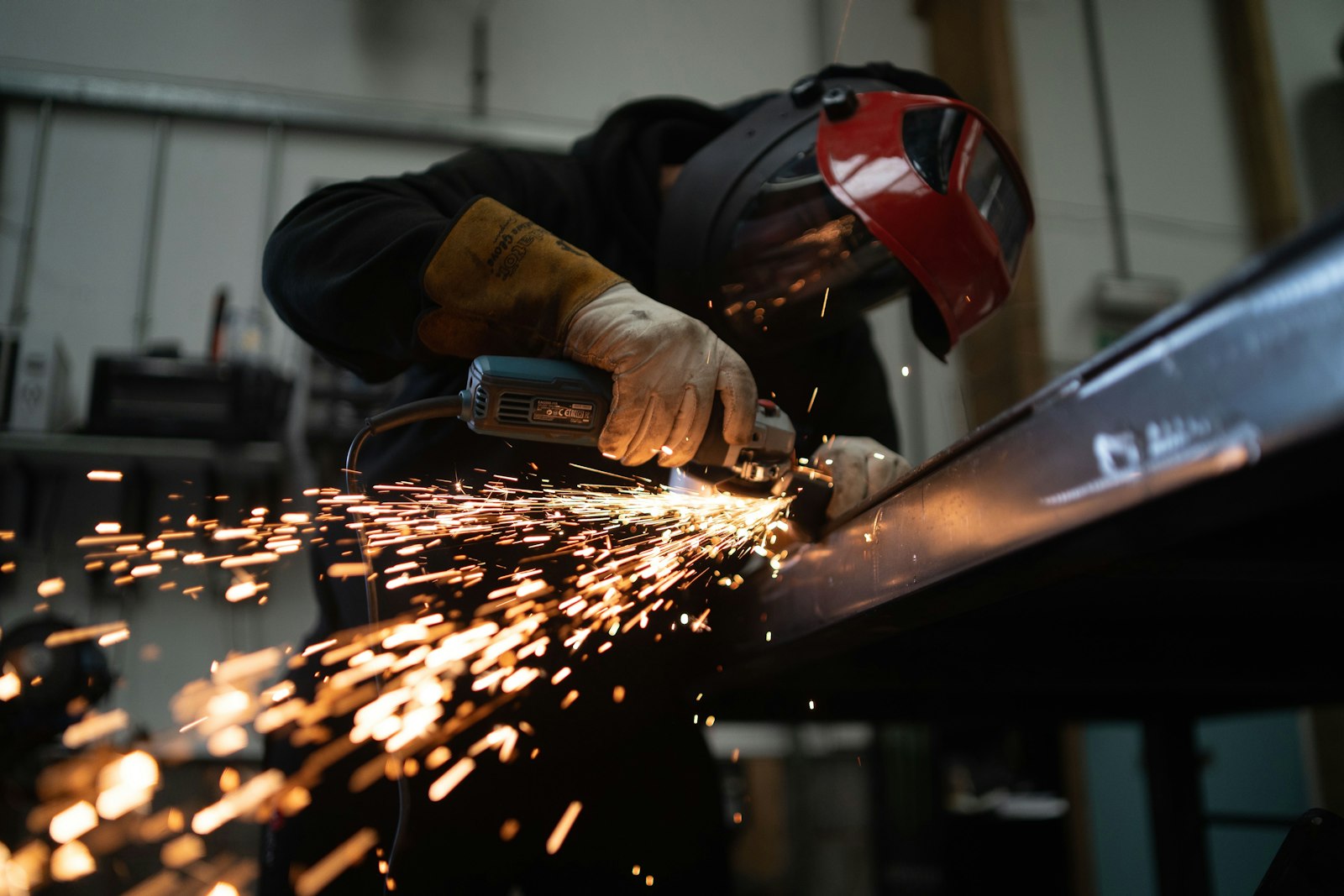 Sparks from metal cutting in a workshop (illustrative)