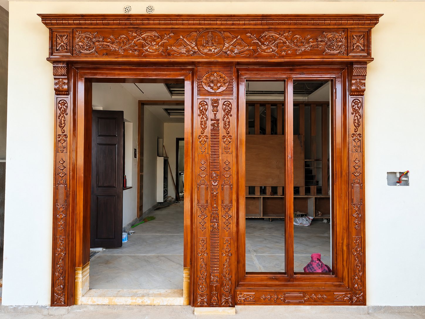 Carved teak entrance with door and window frames
