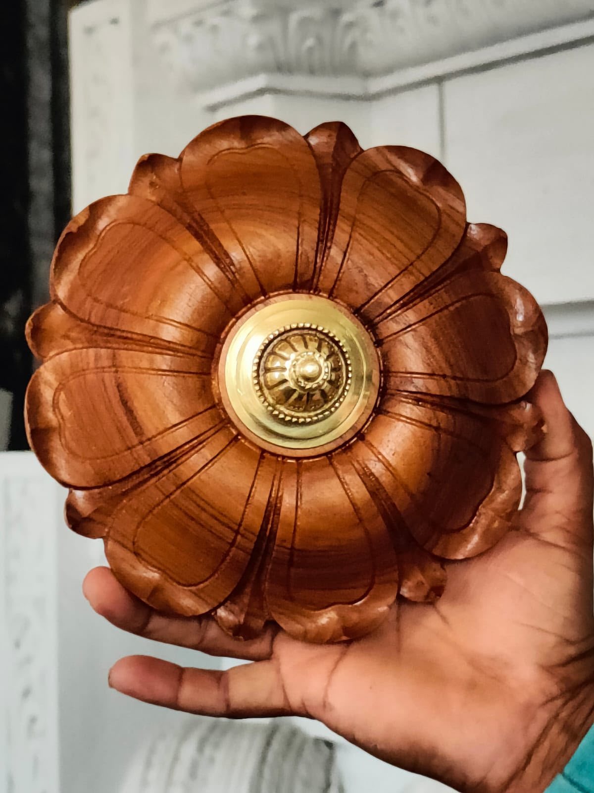 Teak decorative flower with brass centre